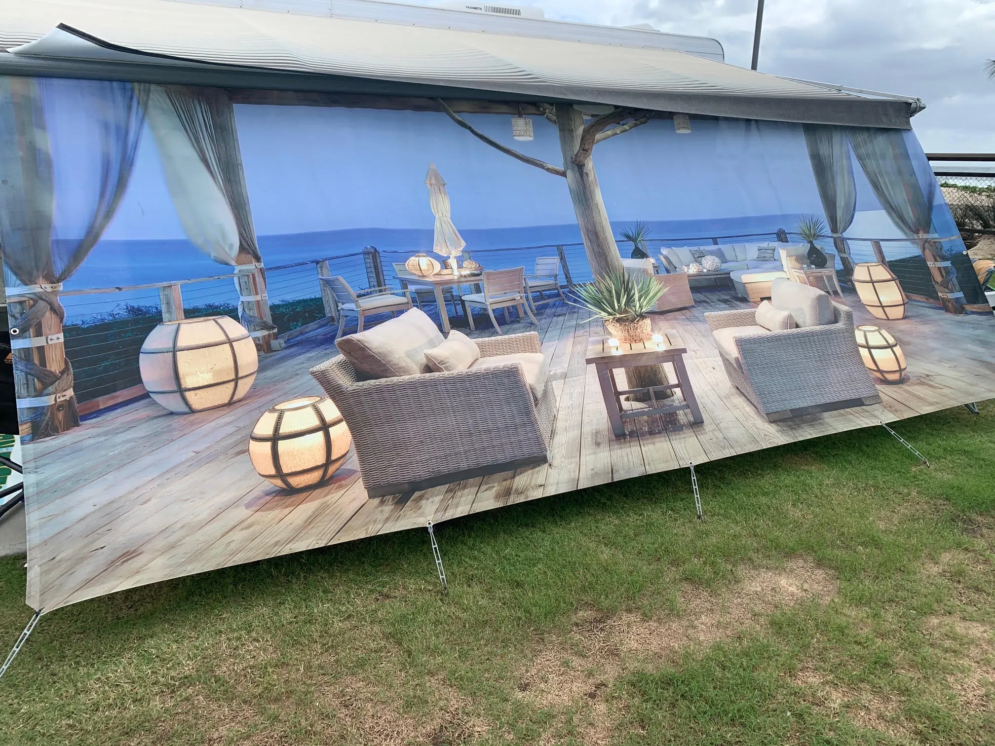 Custom printed privacy screen on a caravan