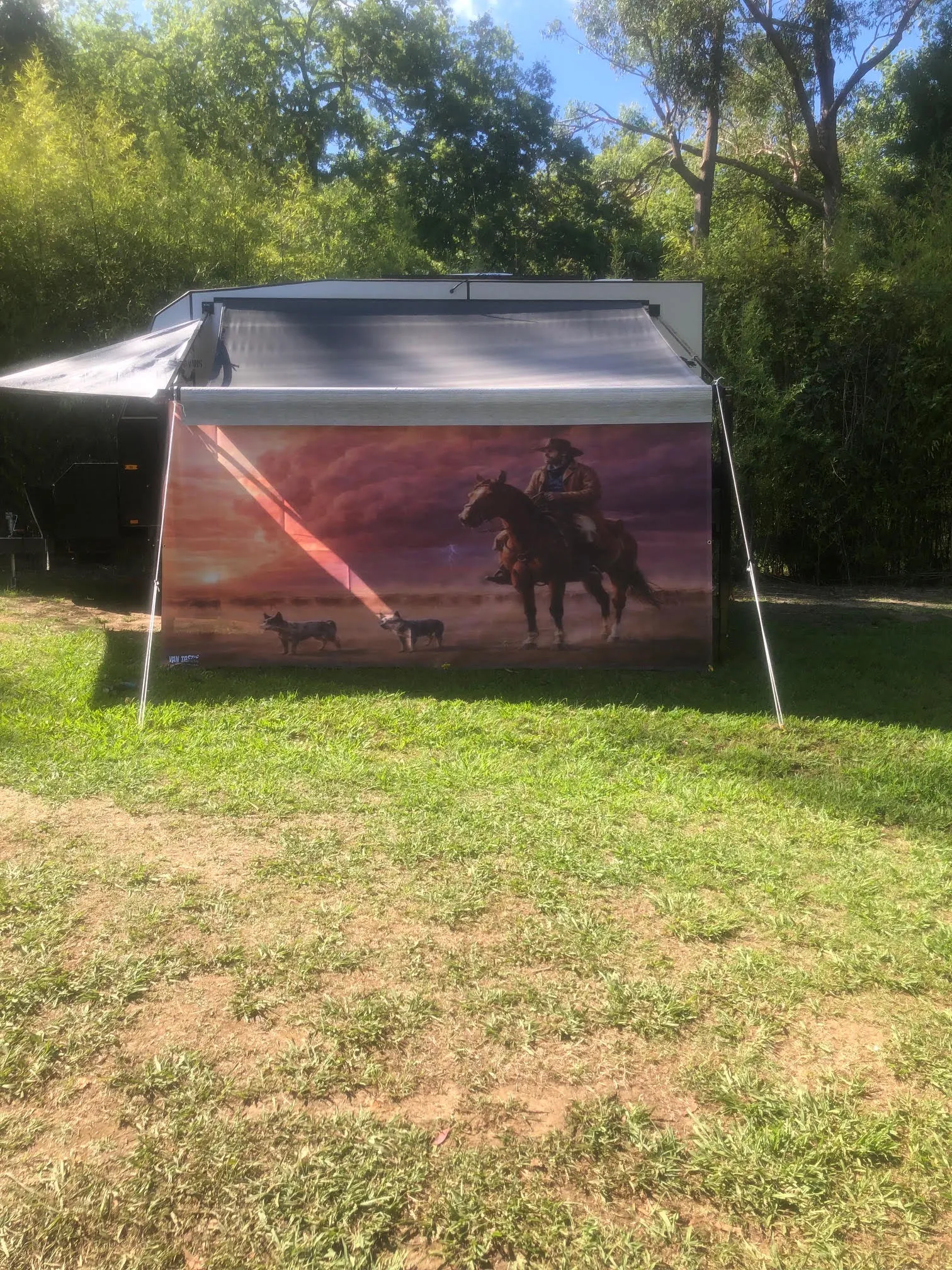 Caravan privacy screen printed with an outback sunset and silhouetted gum trees
